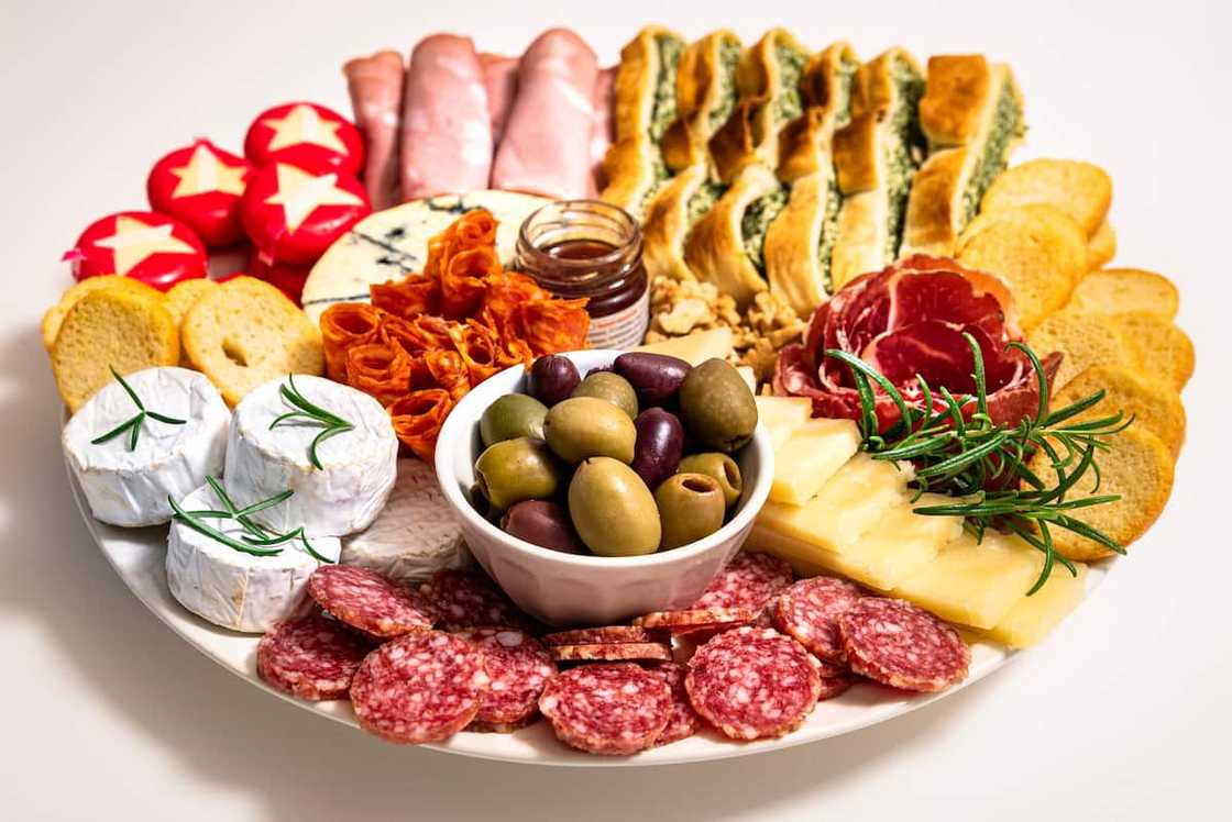 Charcuterie board with snacks Charcuterie board with snacks