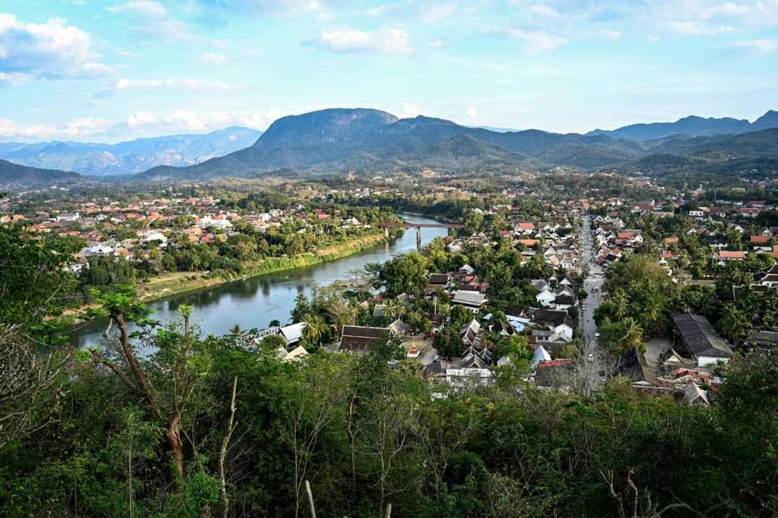 With its blend of traditional Laotian and colonial French architecture, Luang Prabang has long been one of the poor, reclusive country's major tourist draws With its blend of traditional Laotian and colonial French architecture, Luang Prabang has long been one of the poor, reclusive country's major tourist draws