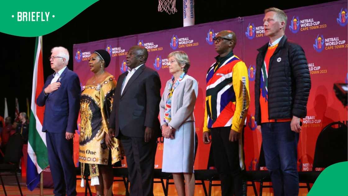 Officials singing the national anthem. Officials singing the national anthem.