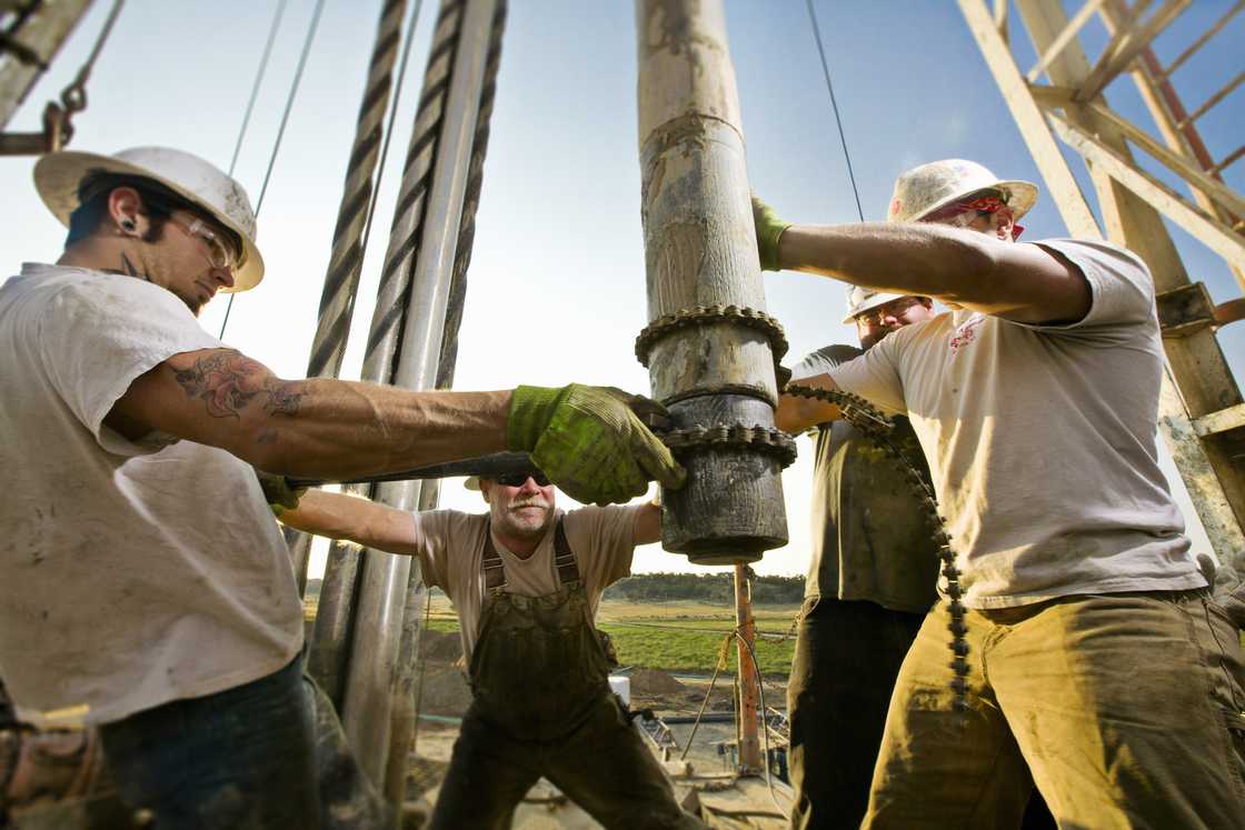 Oil rig workers on the drilling site