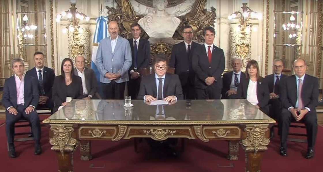 Argentine President Javier Milei (C) delivered his speech to the nation from the Casa Rosada presidential palace in Buenos Aires, flanked by his cabinet Argentine President Javier Milei (C) delivered his speech to the nation from the Casa Rosada presidential palace in Buenos Aires, flanked by his cabinet