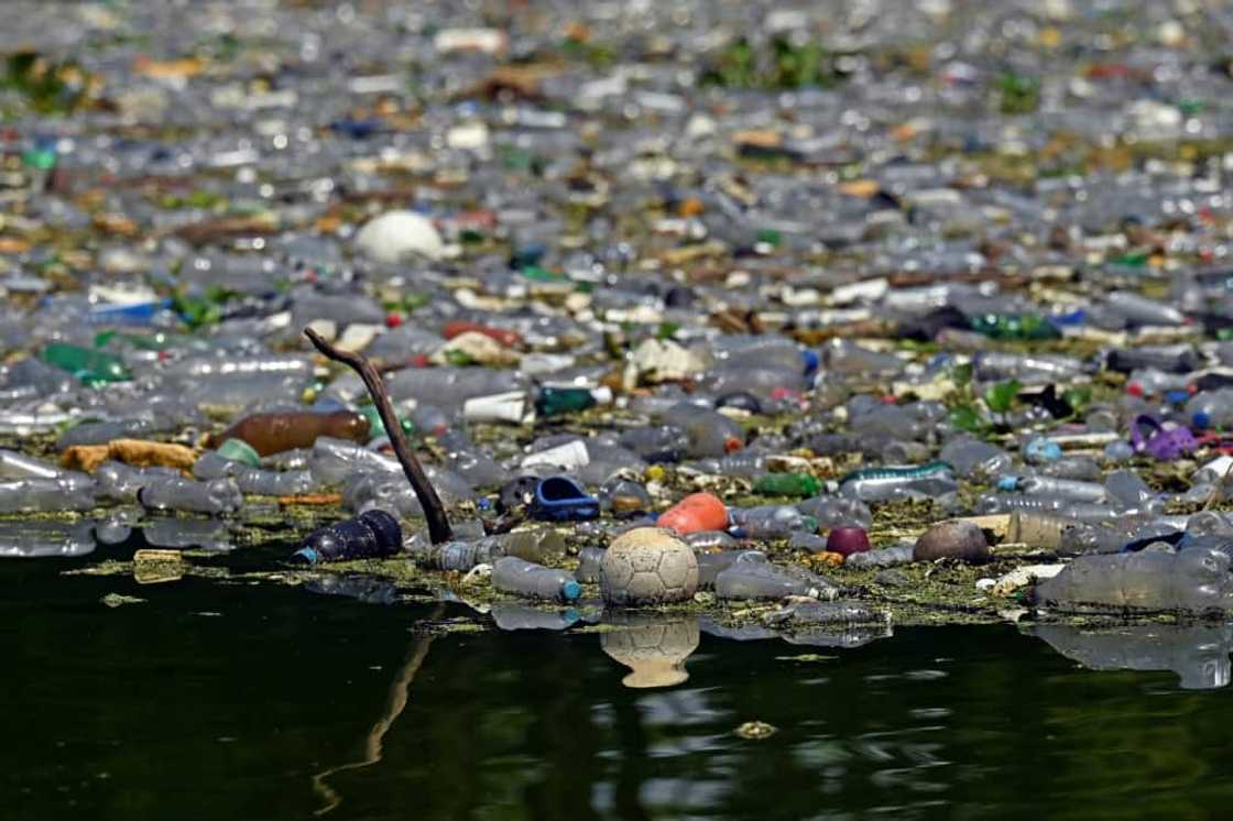 Plastic waste floats on the Cerron Grande reservoir in Potonico, El Salvador Plastic waste floats on the Cerron Grande reservoir in Potonico, El Salvador