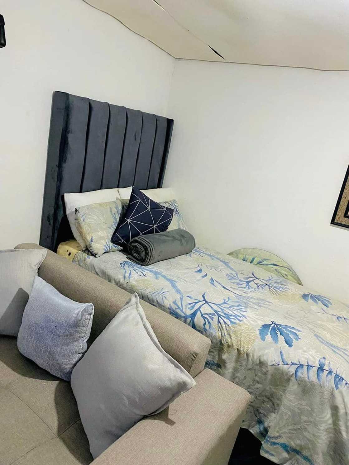 The bedroom with touches of grey and black The bedroom with touches of grey and black