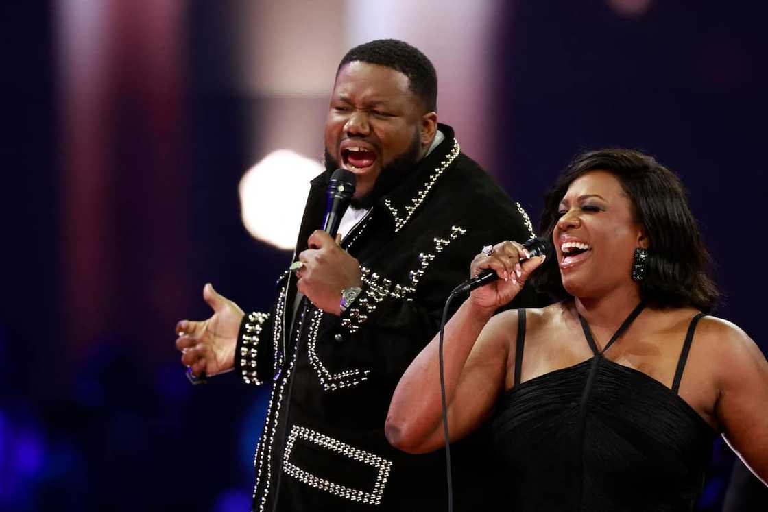 Michael Trotter Jr. and Tanya Trotter perform on stage Michael Trotter Jr. and Tanya Trotter perform on stage