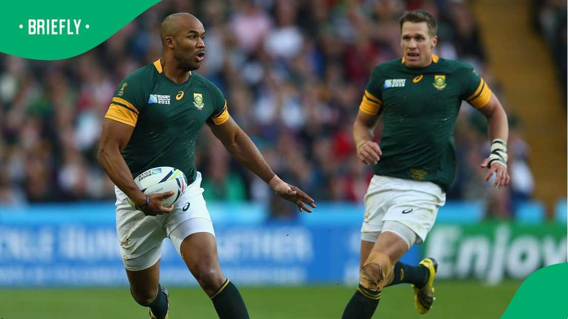 Former Springboks rugby player in action on the field. Former Springboks rugby player in action on the field.