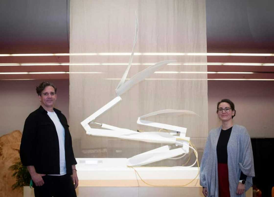 Dutch artist Thijs Biersteker (L) and scientist Adriana de Palma pose in front of "ECONARIO" an art installation by Biersteker, during the United the Nations Biodiversity Conference (COP15) in Montreal Dutch artist Thijs Biersteker (L) and scientist Adriana de Palma pose in front of "ECONARIO" an art installation by Biersteker, during the United the Nations Biodiversity Conference (COP15) in Montreal