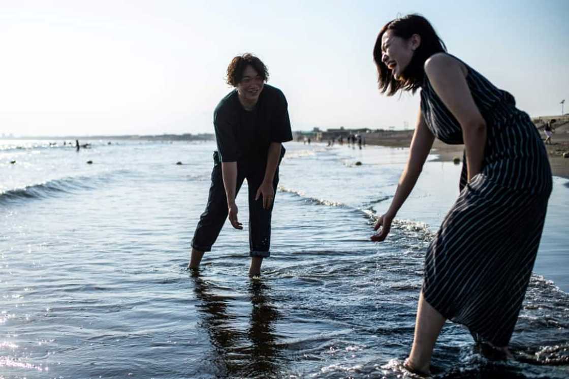 Shizuka (R) and Kazuki Kimura left Tokyo behind for the seaside town of Fujisawa Shizuka (R) and Kazuki Kimura left Tokyo behind for the seaside town of Fujisawa