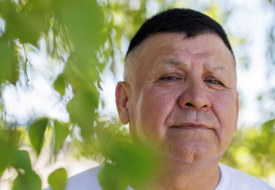 Randy Ermineskin, chief of Ermineskin Cree Nation, poses by a birch tree on June 7 in the Indigenous community of Maskwacis, Alberta. He sat down with AFP to share views and expectations for Pope Francis's end of July visit to Canada in which he is to offer apologies for more than a century of abuses at Indigenous residential schools Randy Ermineskin, chief of Ermineskin Cree Nation, poses by a birch tree on June 7 in the Indigenous community of Maskwacis, Alberta. He sat down with AFP to share views and expectations for Pope Francis's end of July visit to Canada in which he is to offer apologies for more than a century of abuses at Indigenous residential schools