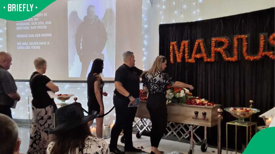 Mourners at Marius Van Der Merwe’s funeral service