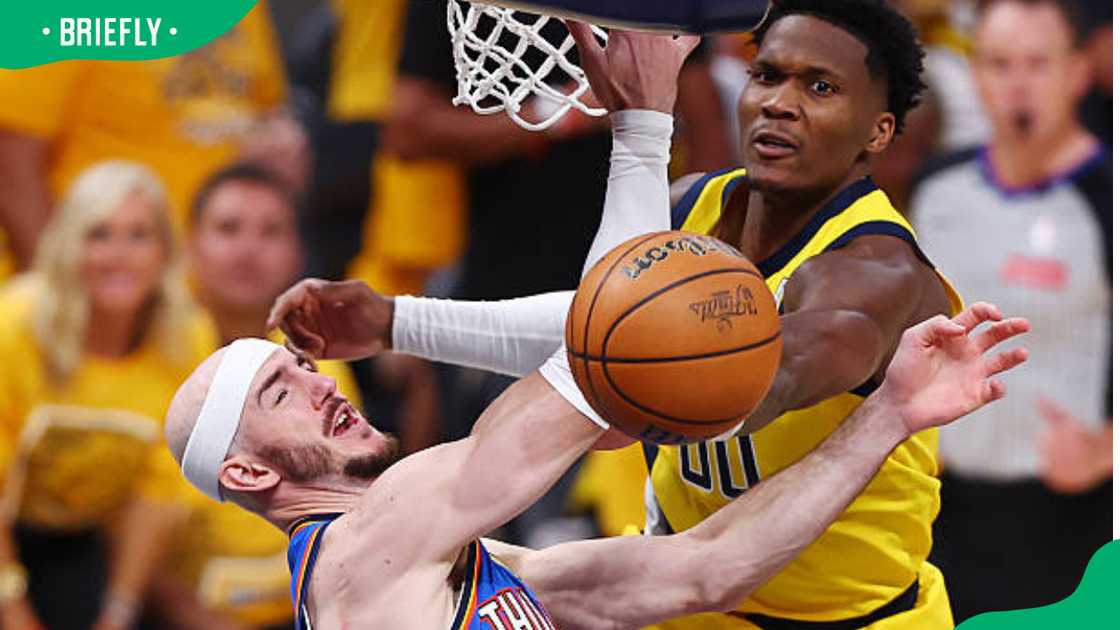 Alex Caruso #9 of the Oklahoma City Thunder and Bennedict Mathurin #00 of the Indiana Pacers during the 2025 NBA Finals Alex Caruso #9 of the Oklahoma City Thunder and Bennedict Mathurin #00 of the Indiana Pacers during the 2025 NBA Finals