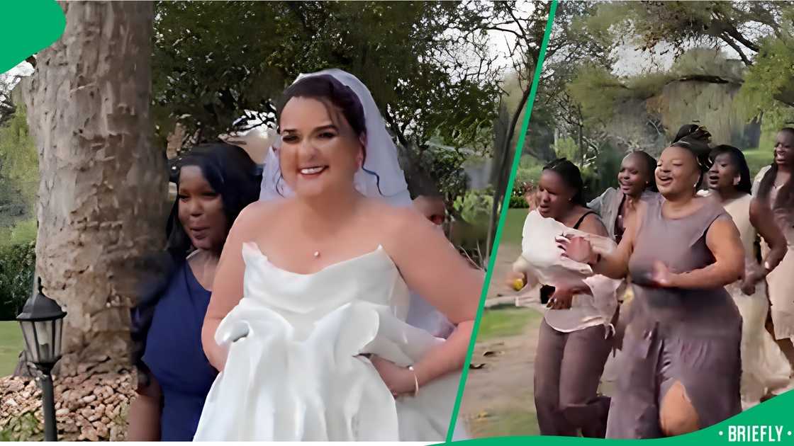 Hotel guests singing behind bride at Toadbury Hall wedding