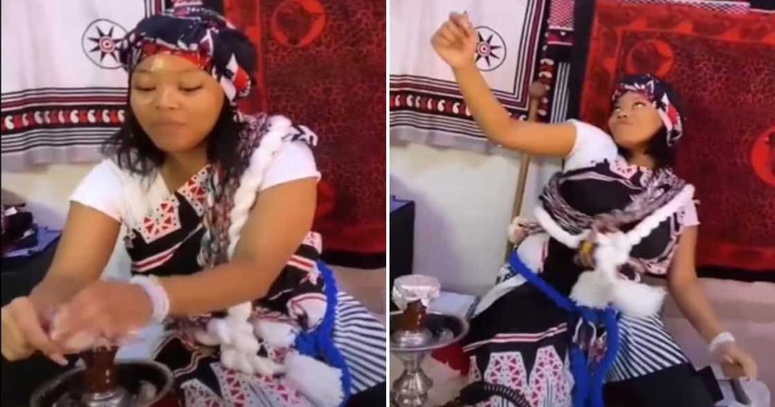 Sangoma dancing and lighting a hubbly Sangoma dancing and lighting a hubbly