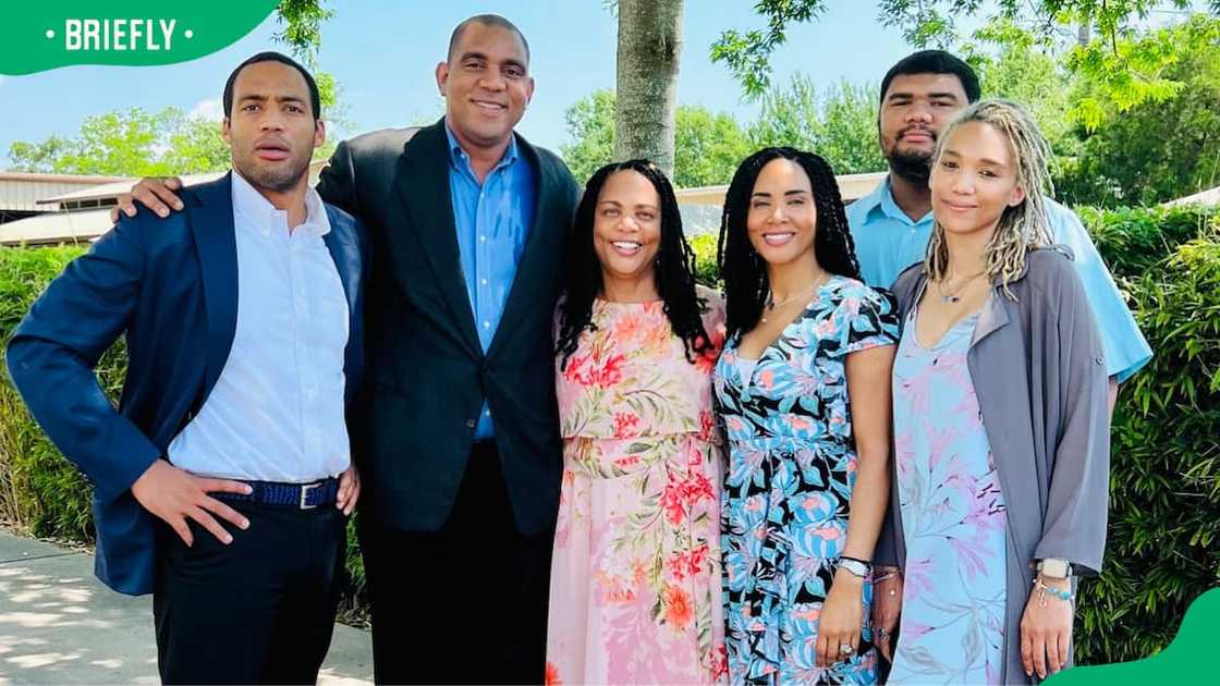 George Foreman alongside his wife and kids George Foreman alongside his wife and kids