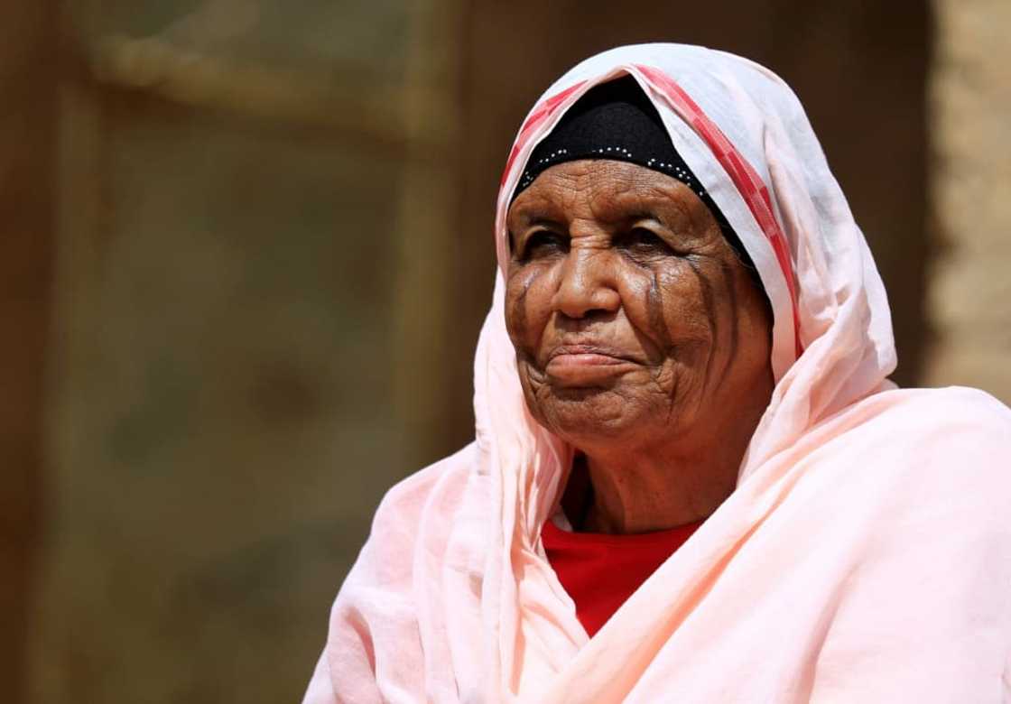 Kholoud Massaed of the Hadaria tribe in Sudan, bears blade scars on her face Kholoud Massaed of the Hadaria tribe in Sudan, bears blade scars on her face