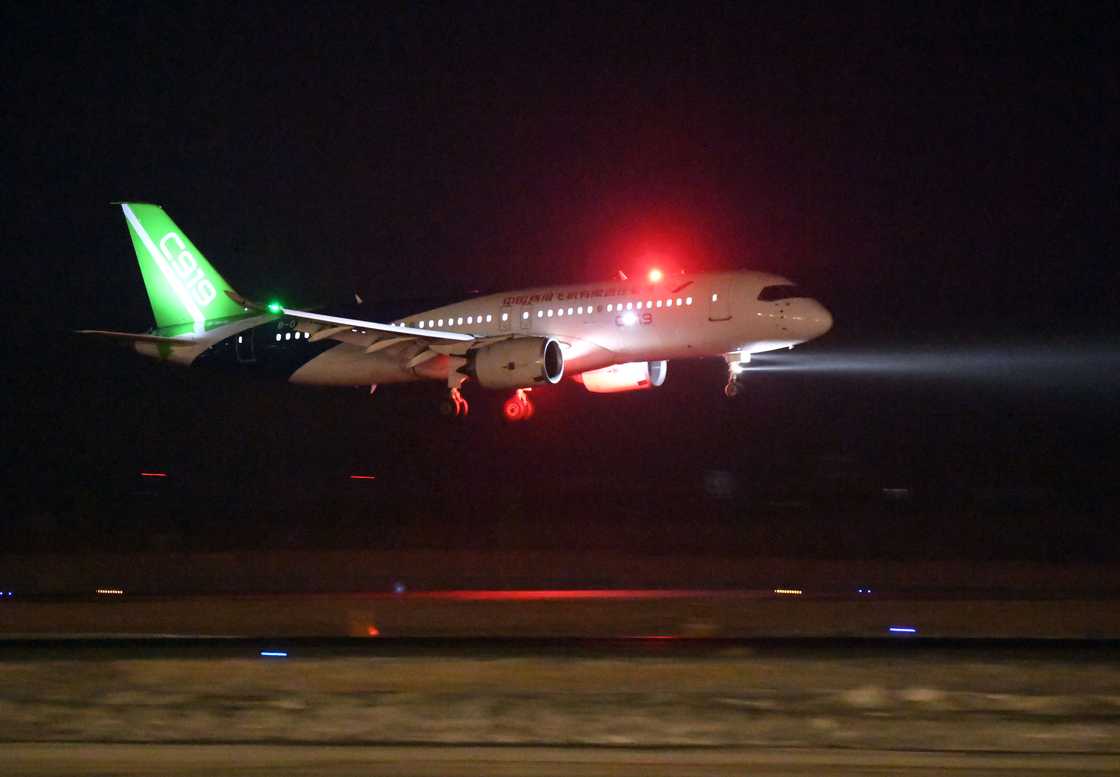 Passenger aircraft landing at night Passenger aircraft landing at night