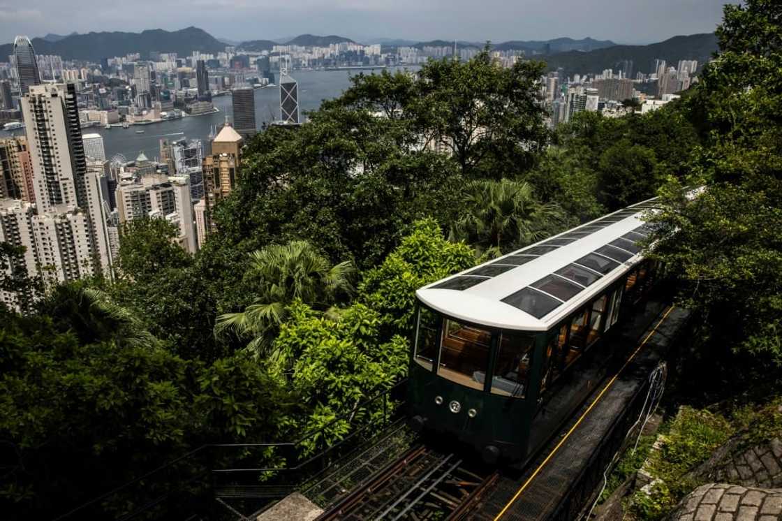 The Peak Tram reopened Saturday after a year-long $102 million facelift even as the city's coronavirus curbs continue to keep overseas visitors at bay The Peak Tram reopened Saturday after a year-long $102 million facelift even as the city's coronavirus curbs continue to keep overseas visitors at bay