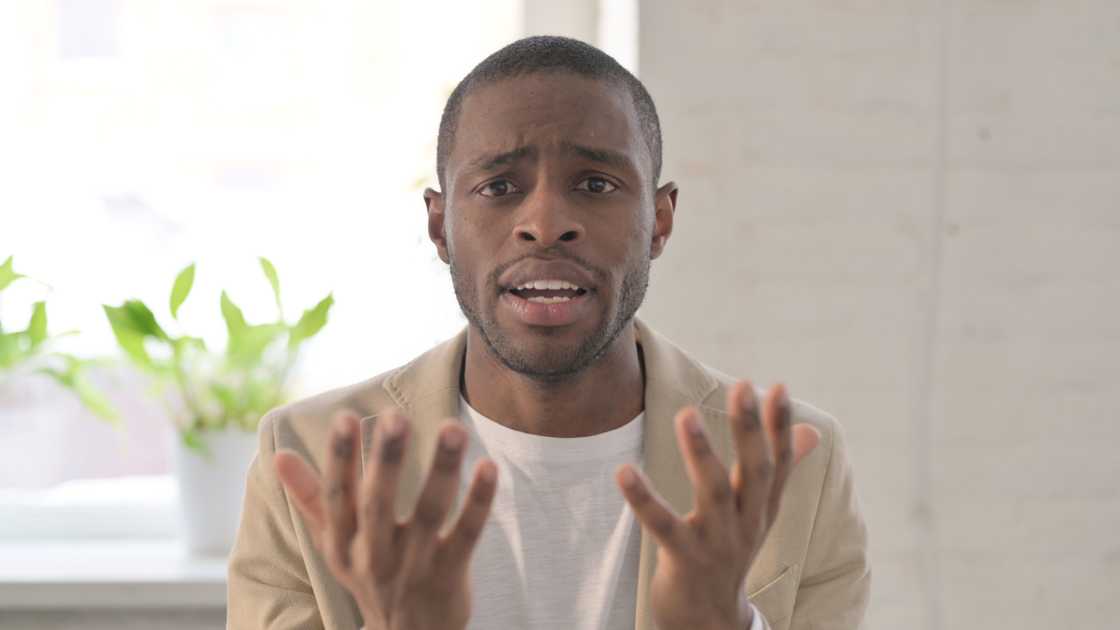 A disappointed man talking