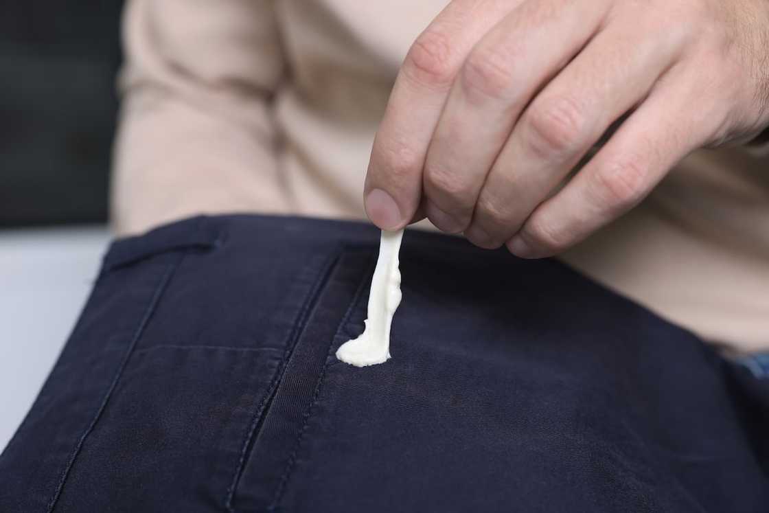 Chewing gum stuck on black pants Chewing gum stuck on black pants