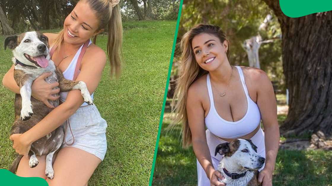 Jem Wolfie holding her dog