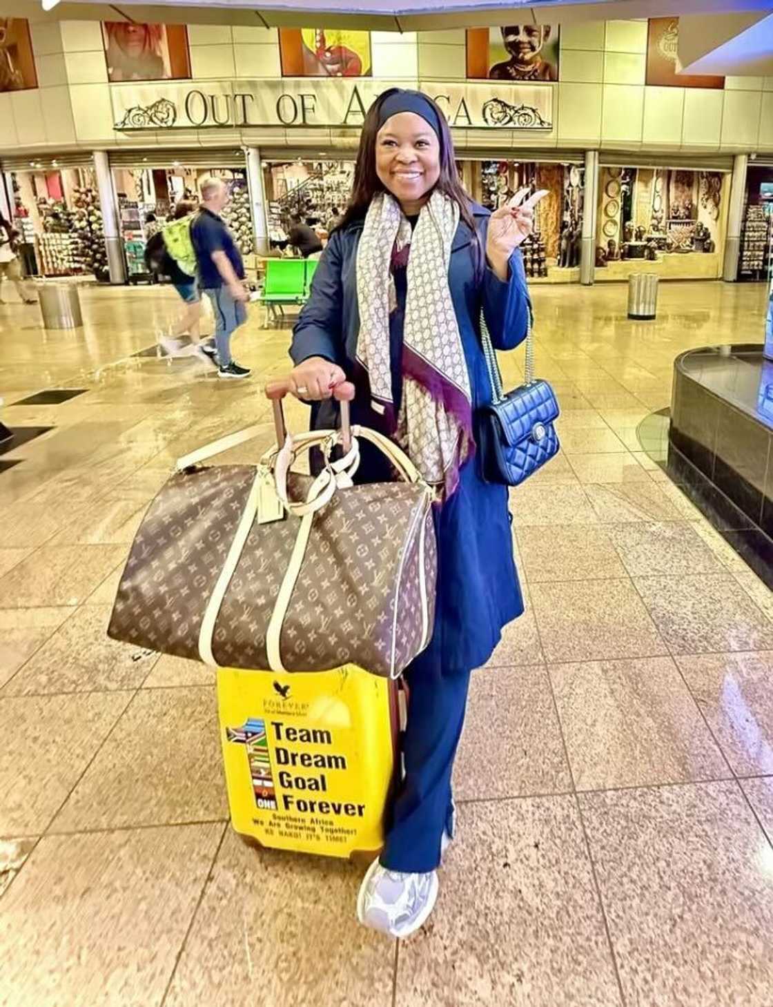 A woman in South Africa posed at an airport in a TikTok video. A woman in South Africa posed at an airport in a TikTok video.