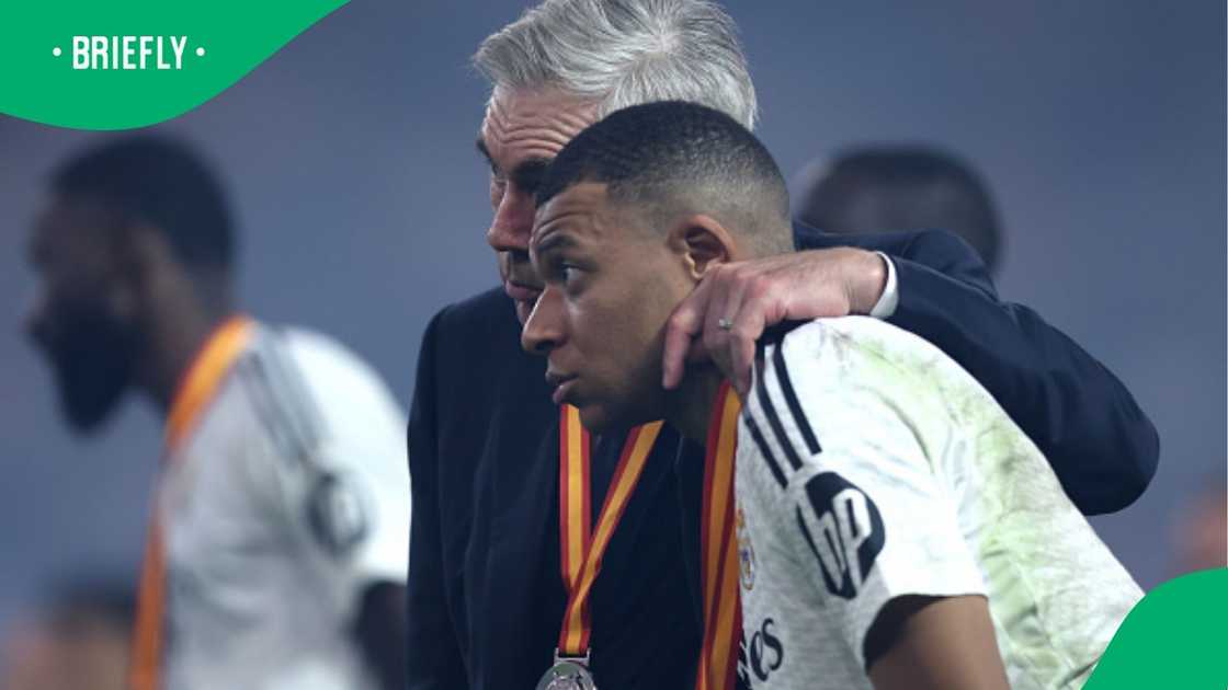 Carlo Ancelotti spotted with Kylian Mbappe after Real Madrid's loss to Barca in the Spanish Super Cup final in Saudi Arabia. Carlo Ancelotti spotted with Kylian Mbappe after Real Madrid's loss to Barca in the Spanish Super Cup final in Saudi Arabia.