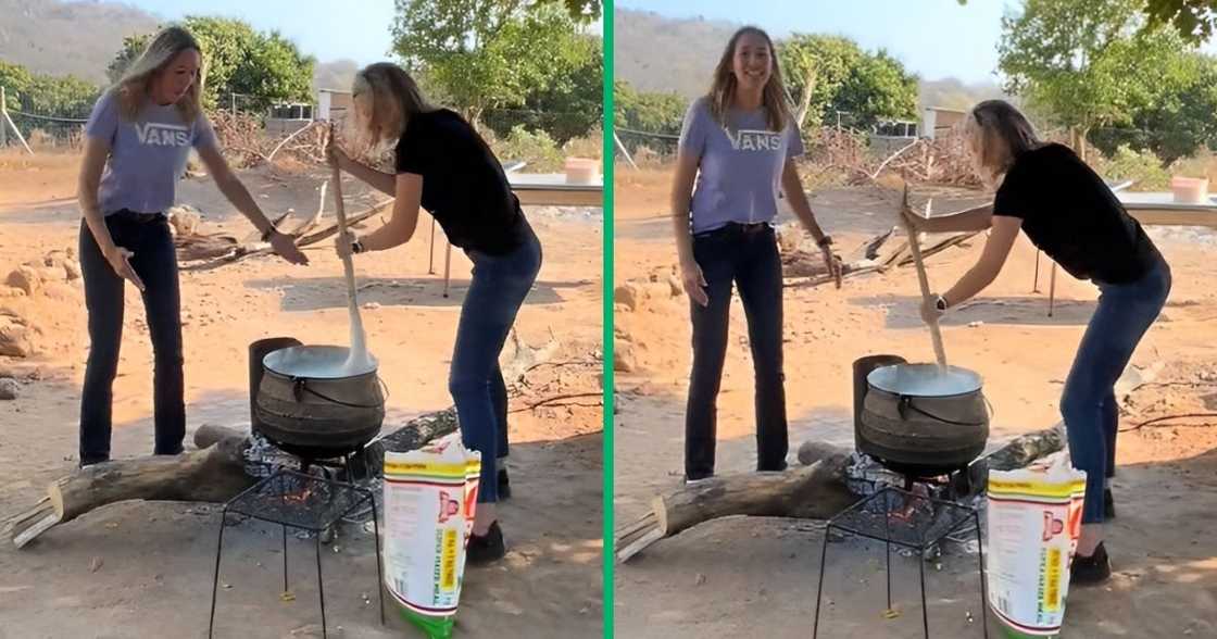 White women cook over fire