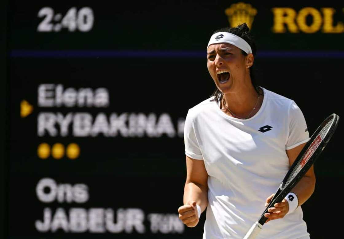 Jabeur celebrates winning a point against Rybakina -- the Tunisian star has called her mother an inspiration