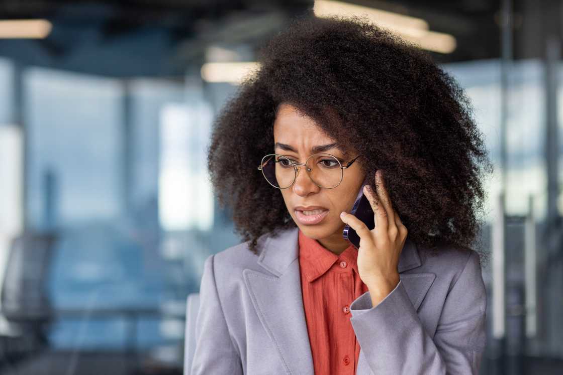 A serious woman on a call