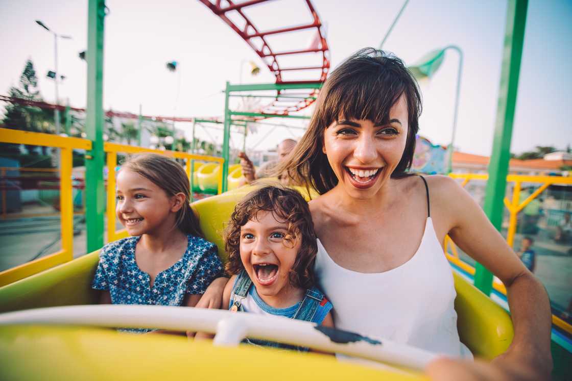 A family was pictured enjoying an amusemnt park ride A family was pictured enjoying an amusemnt park ride