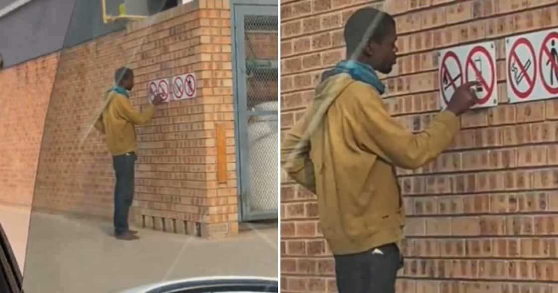 A homeless man dialling the numbers on the picture of a cellphone. A homeless man dialling the numbers on the picture of a cellphone.