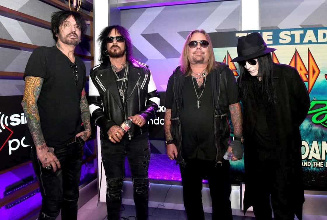 Tommy Lee and other band members of Mötley Crüe Tommy Lee and other band members of Mötley Crüe