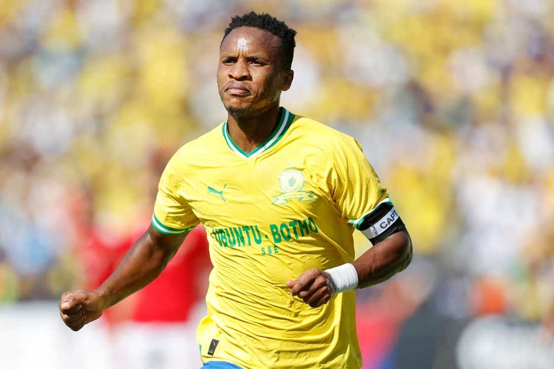 Themba Zwane celebrates after scoring a goal Themba Zwane celebrates after scoring a goal