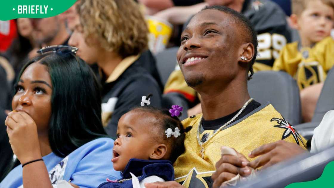 Henry Ruggs III and his daughter Kenzli Re'Nai Ruggs during the 2021 Stanley Cup Semifinals