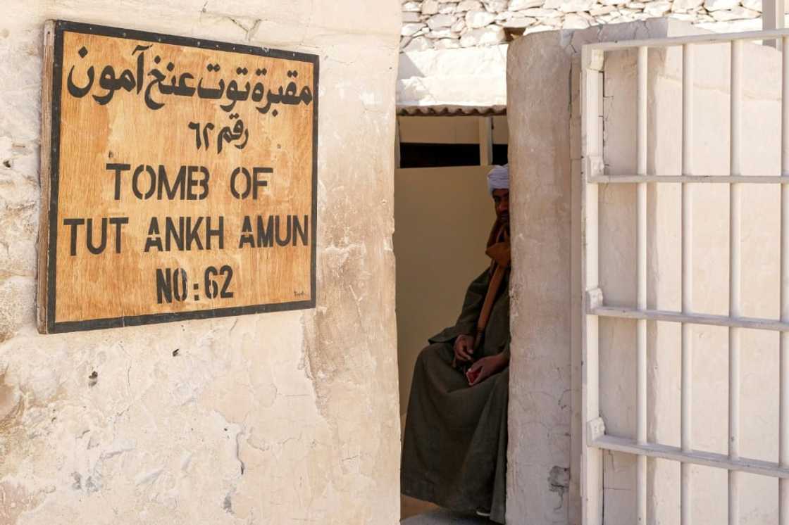 A caretaker sits outside the tomb of the pharaoh Tutankhamunin in the Valley of the Kings at Luxor A caretaker sits outside the tomb of the pharaoh Tutankhamunin in the Valley of the Kings at Luxor