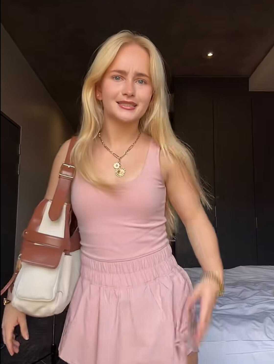 A woman in Cape Town wore an all-pink outfit as she posed to create content for TikTok. A woman in Cape Town wore an all-pink outfit as she posed to create content for TikTok.