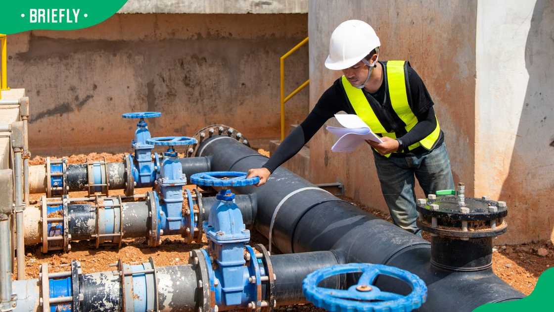 An engineer at a chemical plant An engineer at a chemical plant