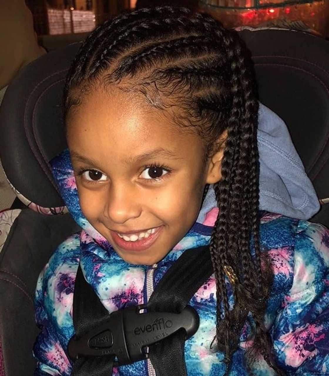 Side-swept cornrows with braids Side-swept cornrows with braids