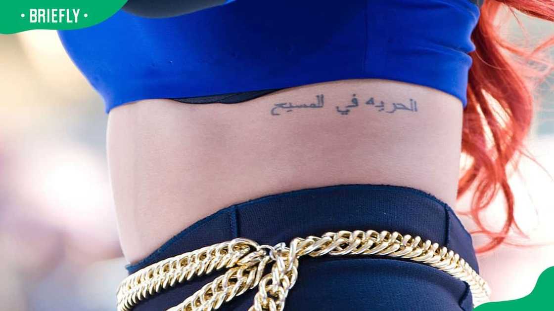 Rihanna's Arabic script tattoo Rihanna's Arabic script tattoo