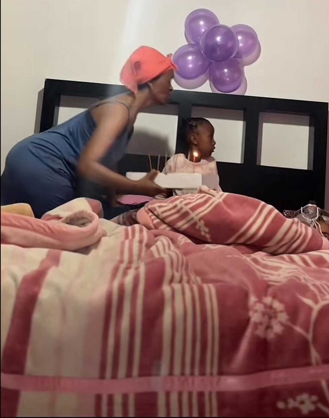 A lady's hair caught on fire while a girl blew out her candle in a TikTok video. A lady's hair caught on fire while a girl blew out her candle in a TikTok video.