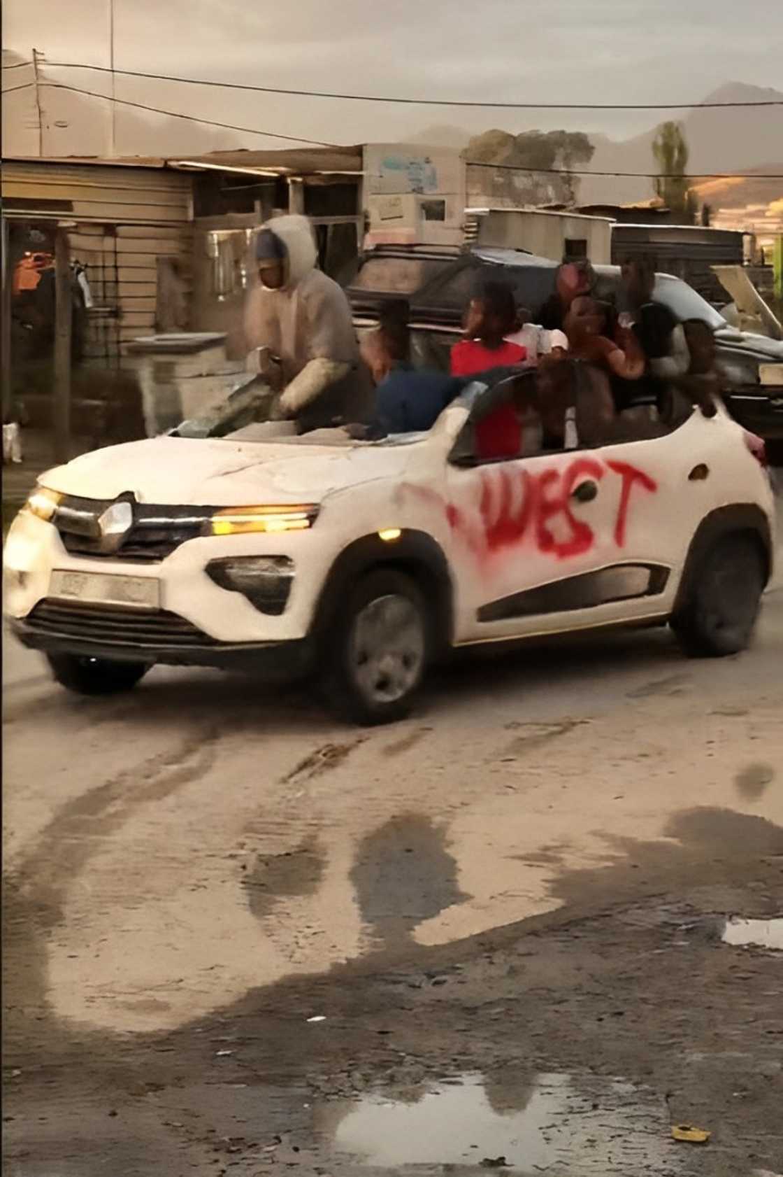 A customised Renault Kwid without a roof drove in the kasi.