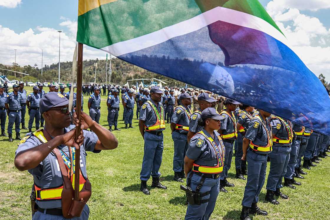 Members of the South African Police Service (SAPS) stand at attention during the Integrated Law Enforcement parade near the Nasrec Expo Centre in Johannesburg, on November 19, 2025 Members of the South African Police Service (SAPS) stand at attention during the Integrated Law Enforcement parade near the Nasrec Expo Centre in Johannesburg, on November 19, 2025