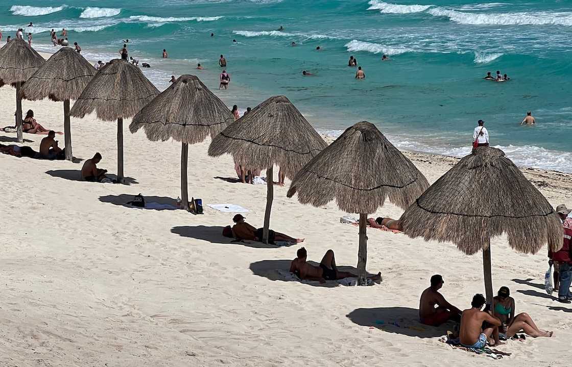 A view of Playa Delfines beach (Dolphin Beach) at the Hotel Zone of Cancun, Quintana Roo State A view of Playa Delfines beach (Dolphin Beach) at the Hotel Zone of Cancun, Quintana Roo State