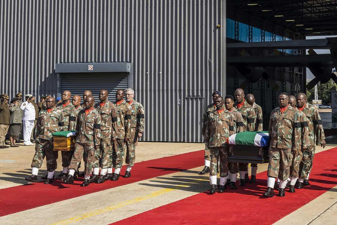 Bodies of SANDF soldiers killed in a previous battle Bodies of SANDF soldiers killed in a previous battle