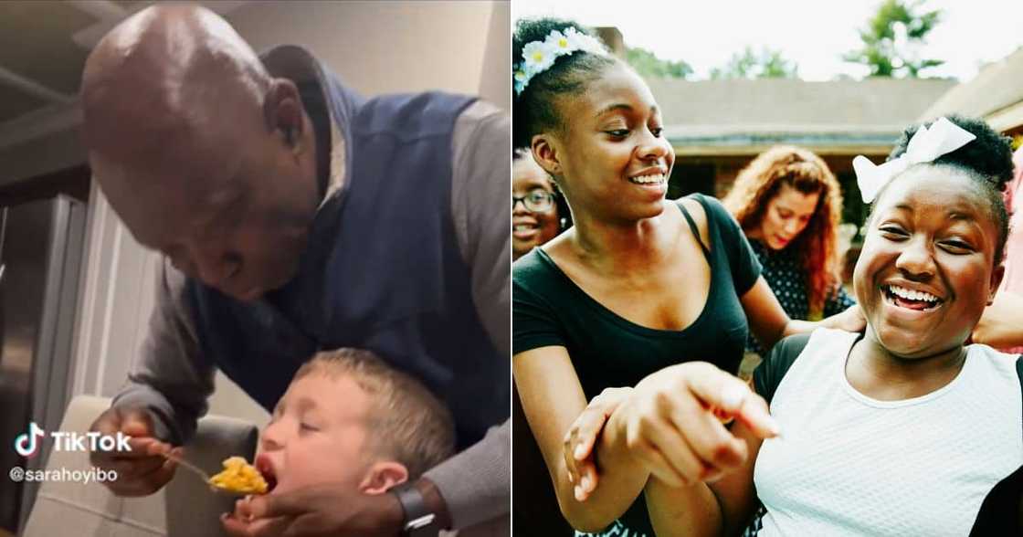 Grandad spoonfeeds grandchild Grandad spoonfeeds grandchild