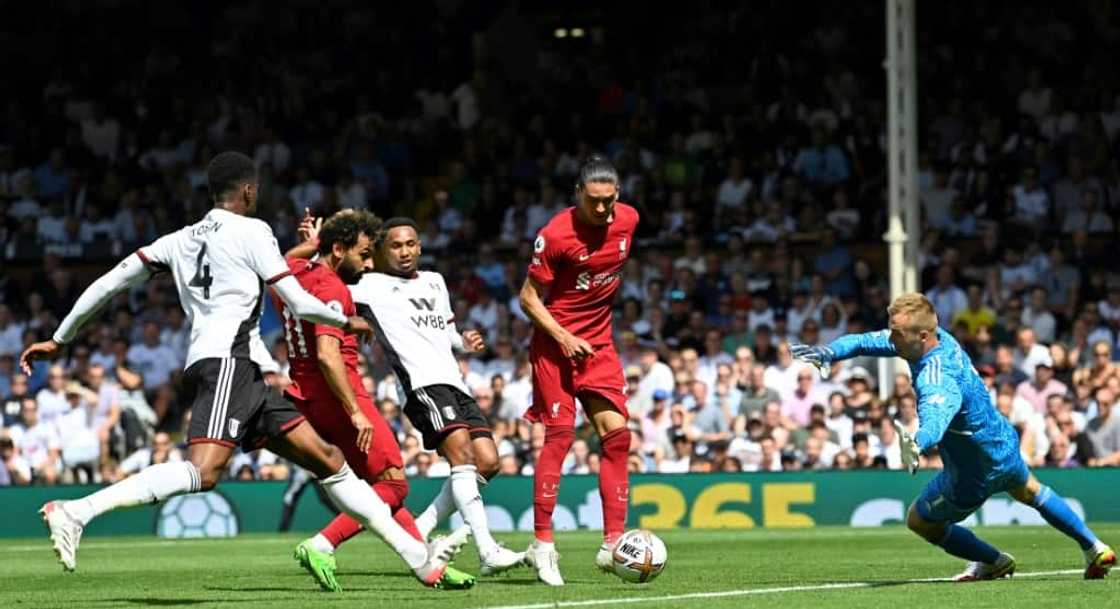 Mohamed Salah (2nd L) equalises for Liverpool in a Premier League draw at Fulham on August 6, 2022.