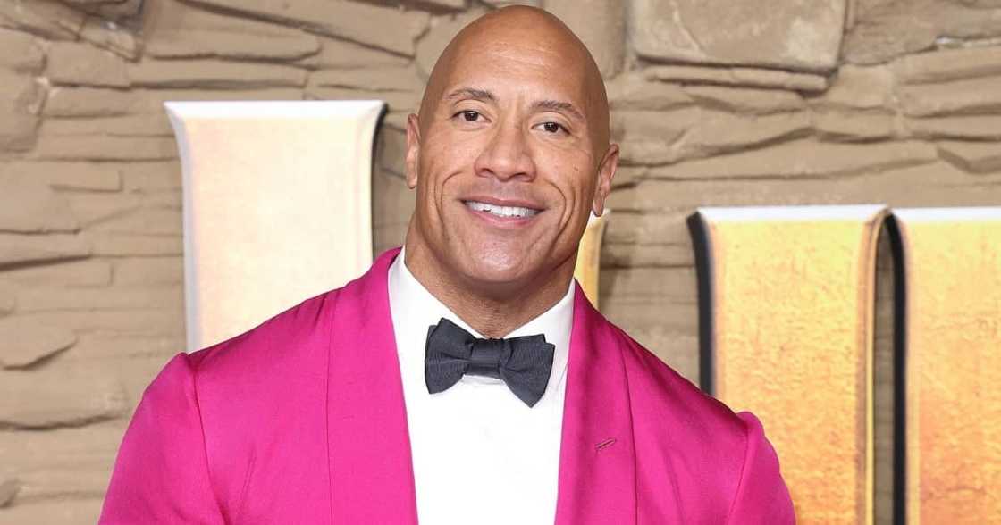 The Rock surprised a teacher who graduated from university after being a school cleaner for more than 20 years. Photo: Getty Images. The Rock surprised a teacher who graduated from university after being a school cleaner for more than 20 years. Photo: Getty Images.