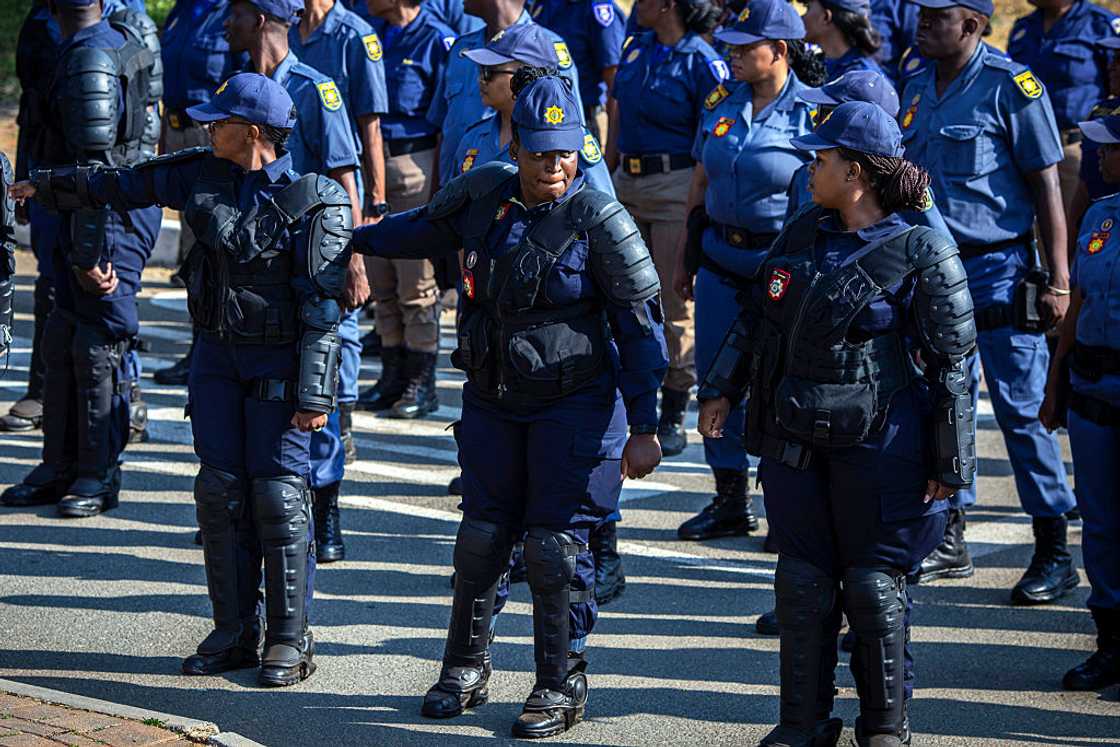 Officers in the South African Police Service (SAPS) prepare for a parade at FNB Stadium on June 26, 2026 Officers in the South African Police Service (SAPS) prepare for a parade at FNB Stadium on June 26, 2026