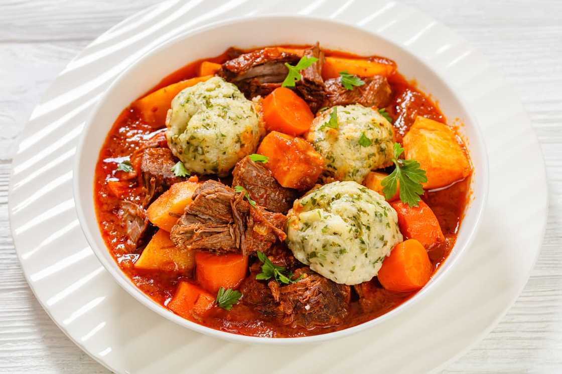 Tomato-rich beef stew and dumplings Tomato-rich beef stew and dumplings