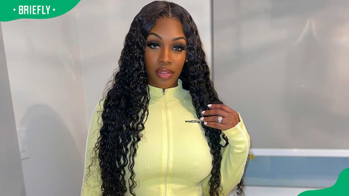 Diamond 'The Body' stuns in a yellow jacket. Diamond 'The Body' stuns in a yellow jacket.