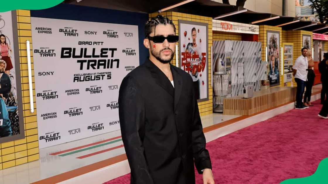 Bad Bunny in a black outfit at the Bullet Train Bad Bunny in a black outfit at the Bullet Train